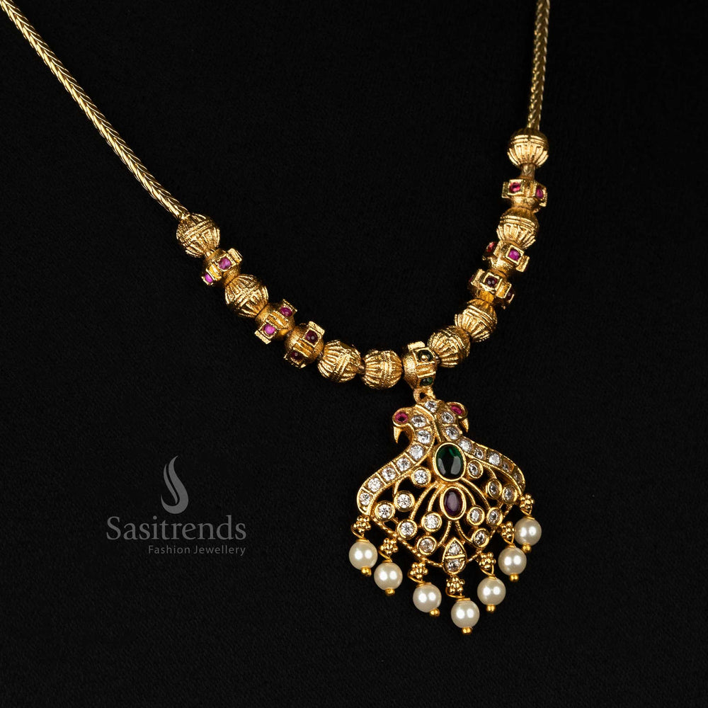 Traditional handcrafted temple jewellery necklace featuring peacock motifs, beaded embellishments, AD stones, and pearl danglers – Sasitrends