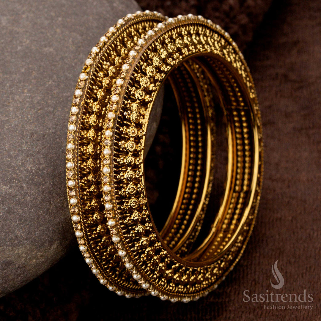 Traditional oxidised gold plated bangles set with finely crafted design - Sasitrends