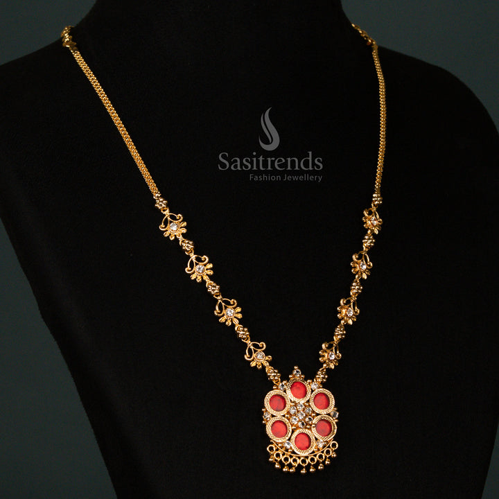 Resplendent one gram micro gold plated Palakka necklace in rich red, featuring a dazzling AD stone-studded floral-round pendant, an embodiment of ethnic jewellery beauty - Sasitrends