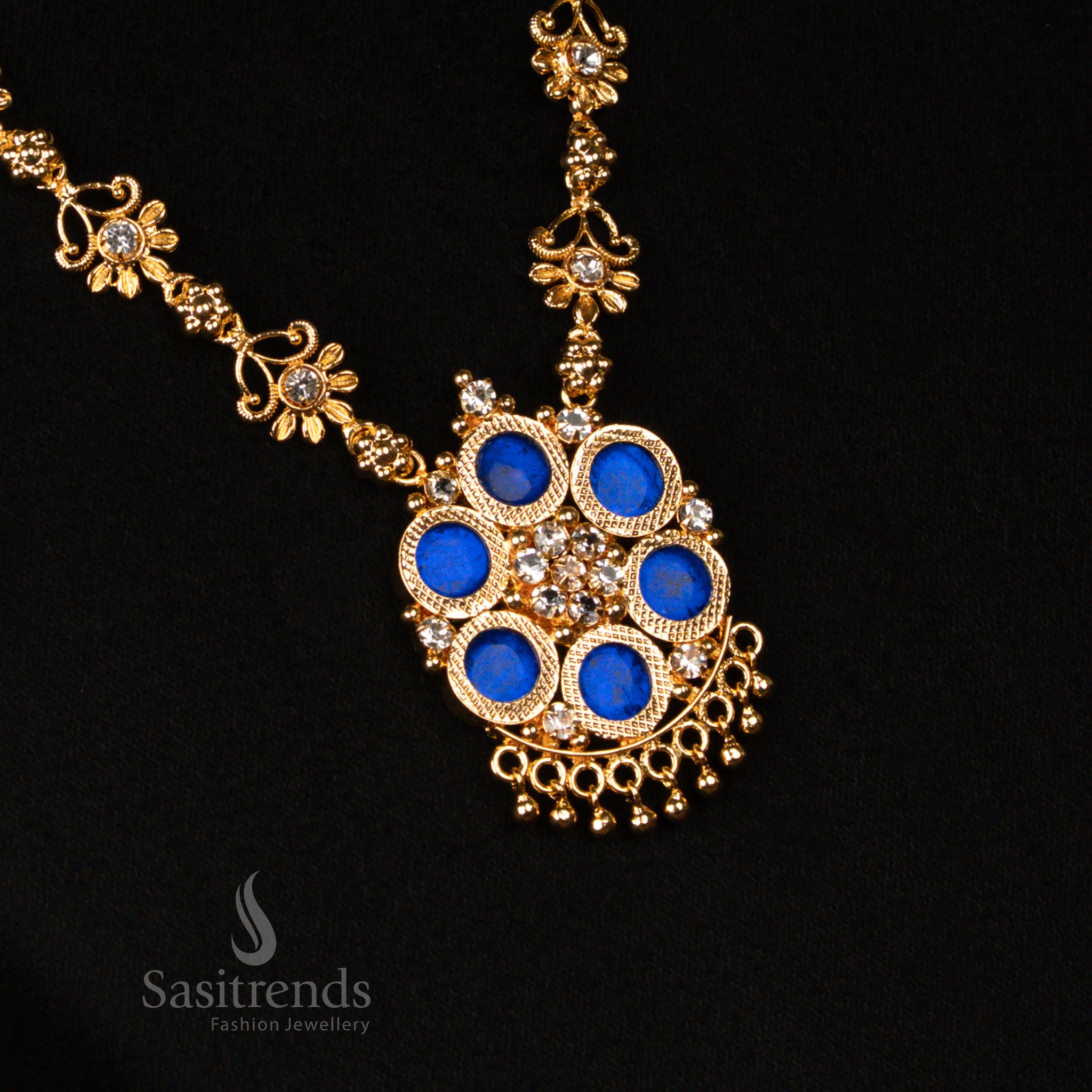 Majestic one gram gold micro plated Kerala-style Palakka necklace in rich blue, showcasing a heritage floral pendant, sparkling AD stones - Sasitrends