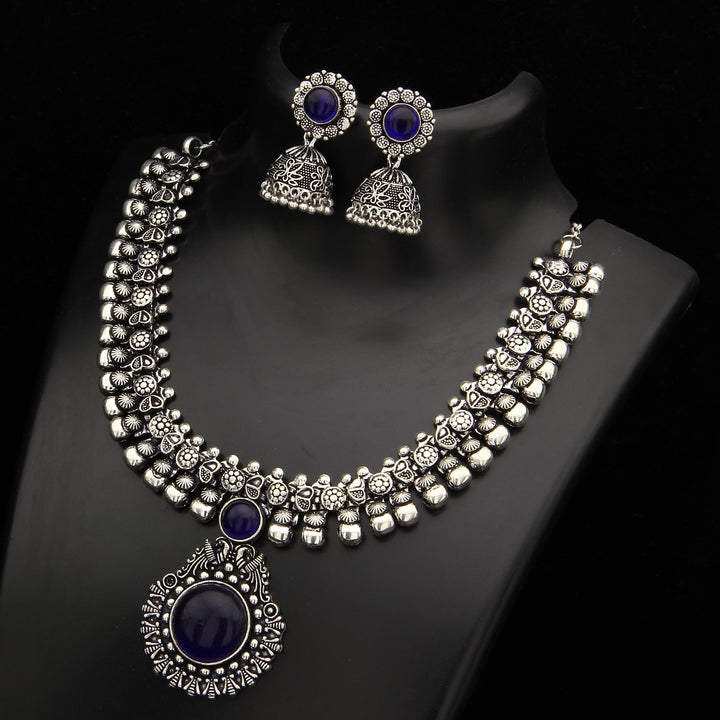 Haarini Oxidised Silver Stones Peacock Pendant and Floral Jhumka Earrings Jewellery Set