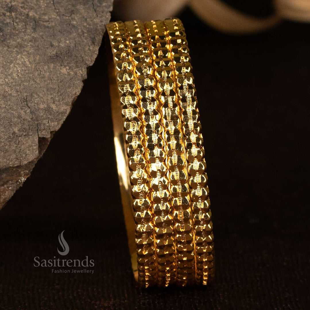 Micro gold-plated bangles featuring intricate diamond-cut detailing - Sasitrends