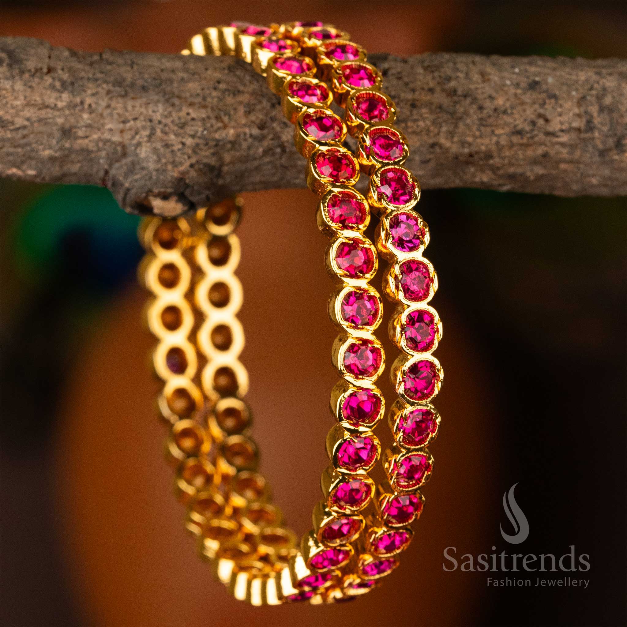 Beautifully handcrafted Micro Gold Plated Para Stones Impon Bangles for Women featuring radiant Pink Stones - Sasitrends