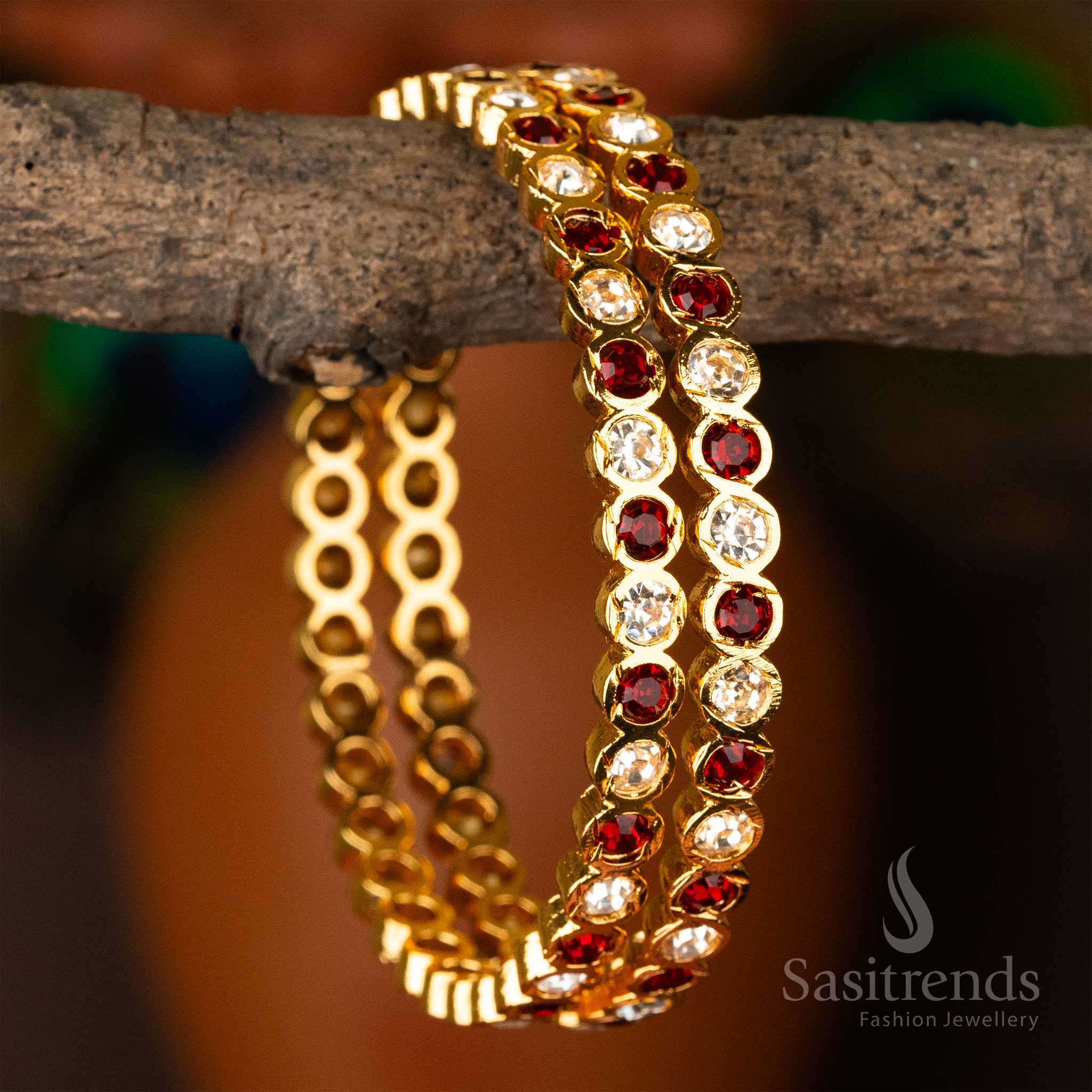 Regal Traditional Micro Gold Plated Para Stones Impon Bangles for Women with a striking combination of Maroon and White Stones - Sasitrends