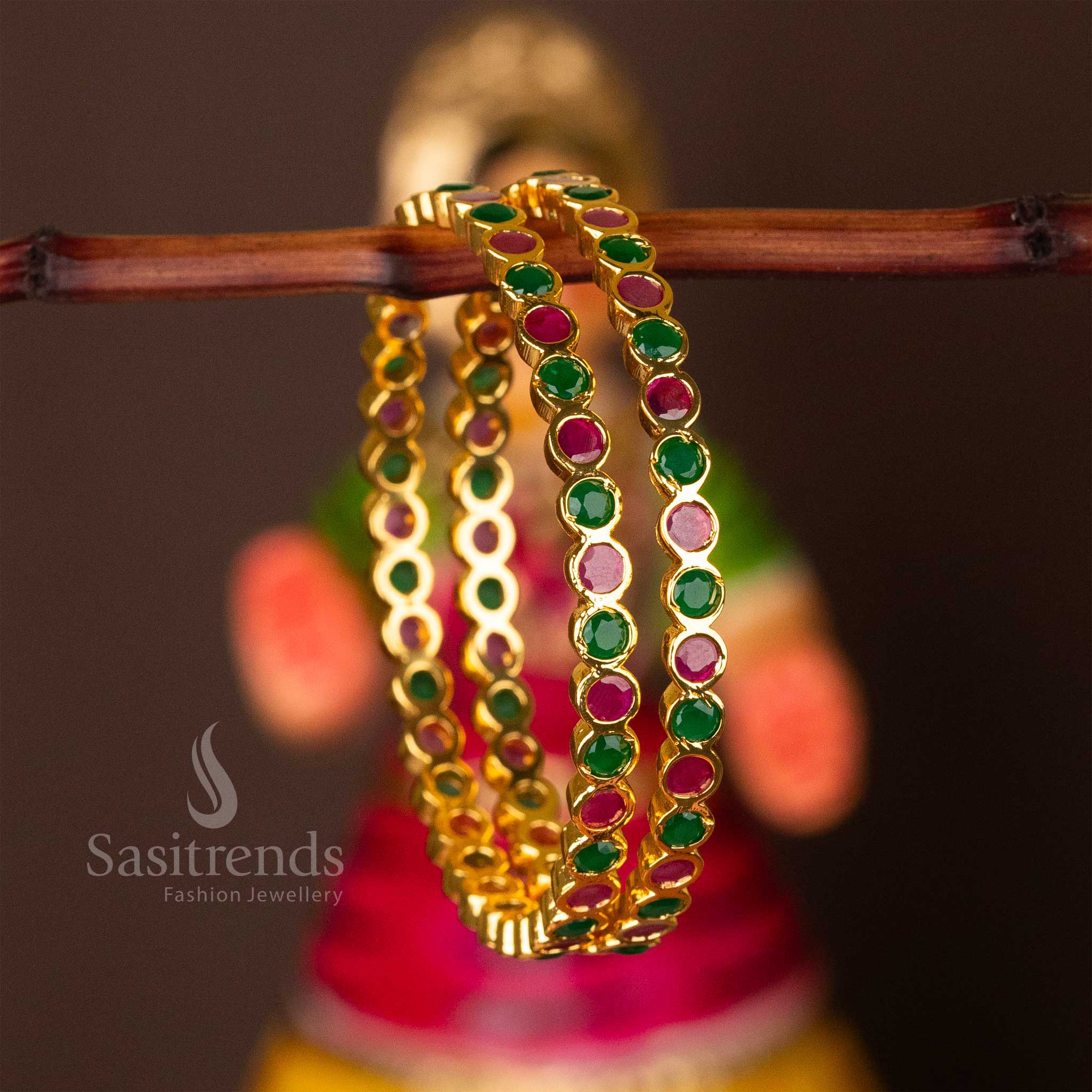 Majestic New Traditional Micro Gold Plated Addigai Bangles with AD Stone, adorned with a mesmerizing blend of Ruby and Green Stones, offering a rich temple-style jewellery look - Sasitrends