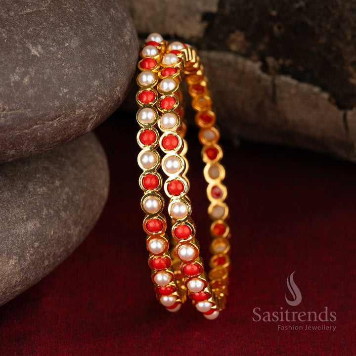 Luxurious Traditional Micro Gold Plated Addigai Bangles with AD Stones, beautifully studded with Pearl and Pavalam Stones, showcasing a unique and rich ethnic appeal - Sasitrends