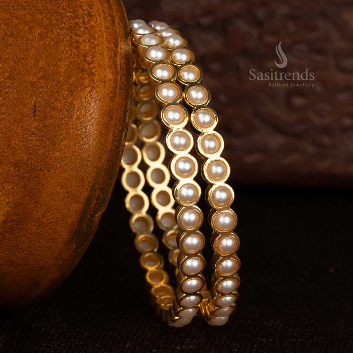 Gold-plated Addigai bangles with AD stones and pearl detailing - Sasitrends