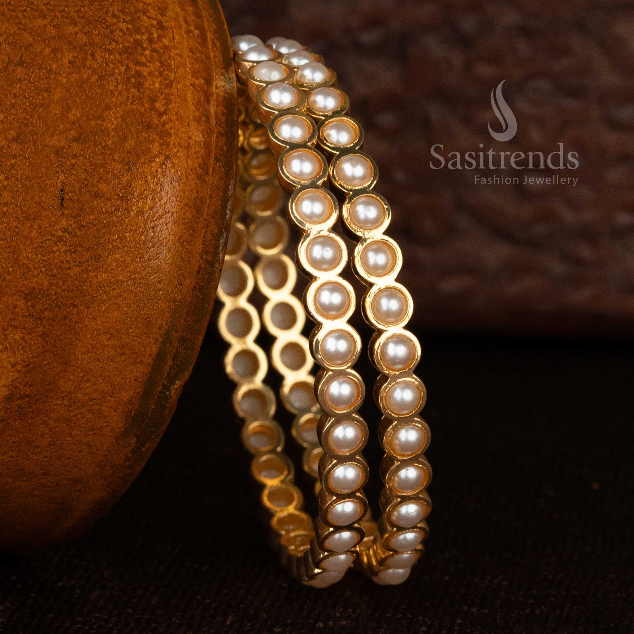 Classic New Traditional Micro Gold Plated Addigai Bangles with AD Stone, adorned with shimmering Pearls, embodying timeless elegance and a regal ethnic touch - Sasitrends