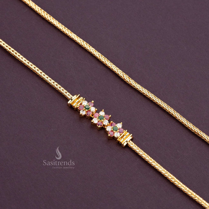 Vibrant three-flower design with ruby, green, and white AD stones on a micro gold-plated mugappu chain - Sasitrends