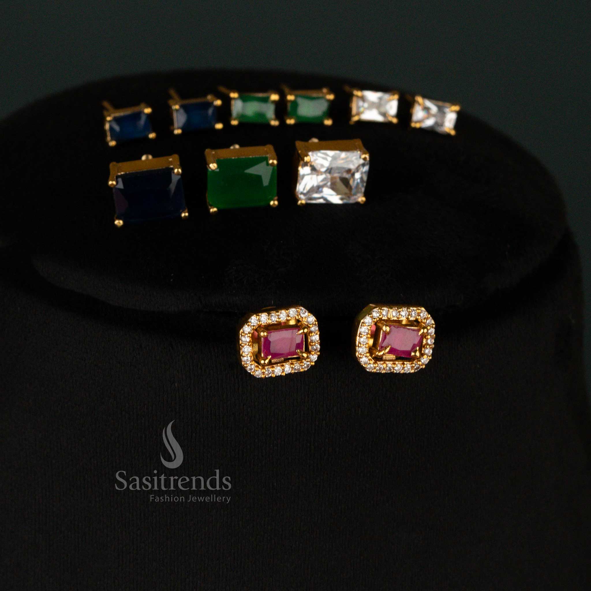 Classic temple-inspired American diamond earrings set with a matte gold finish and halo-set centerpiece - Sasitrends