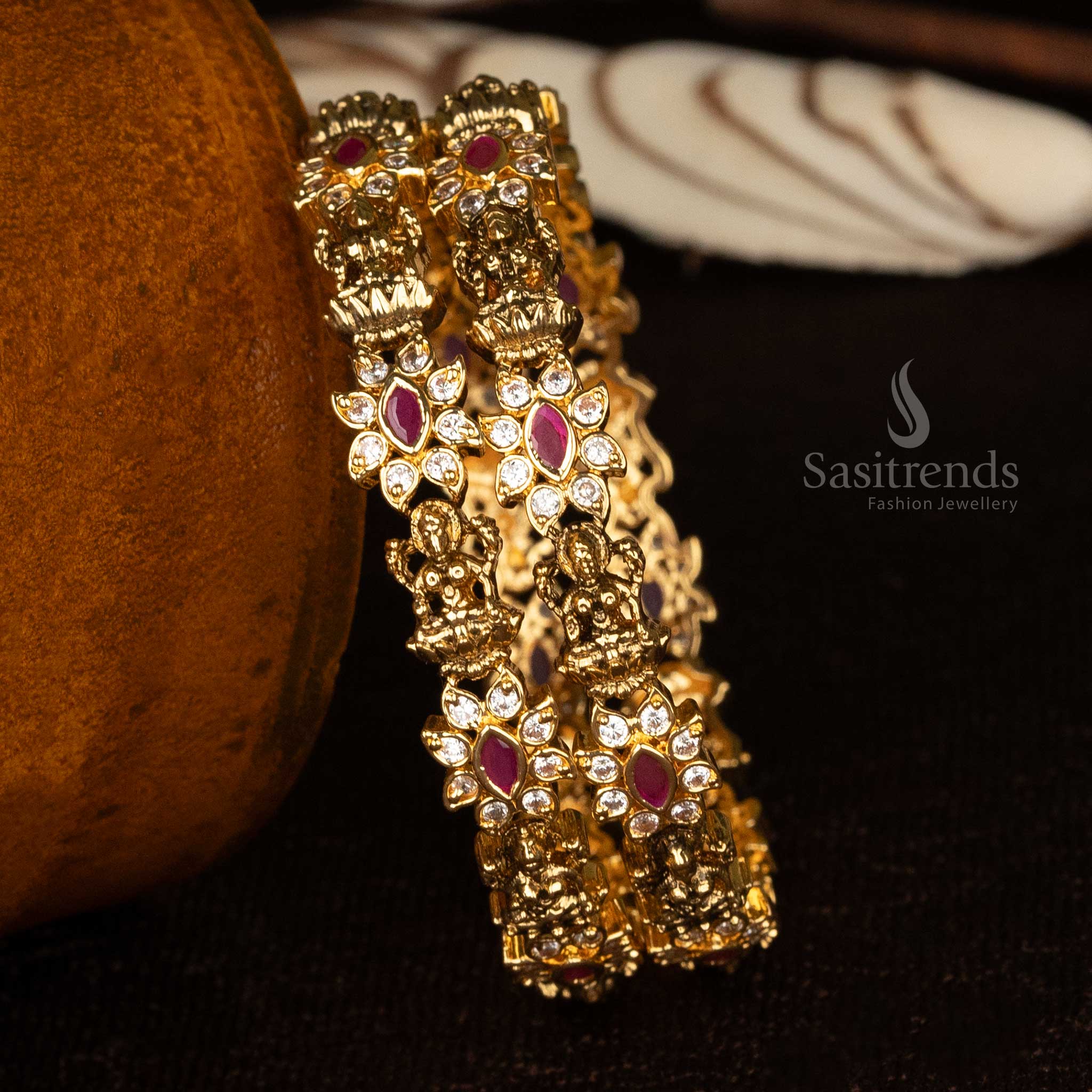 Exquisite matte gold-plated temple bangles with Lakshmi design - Sasitrends