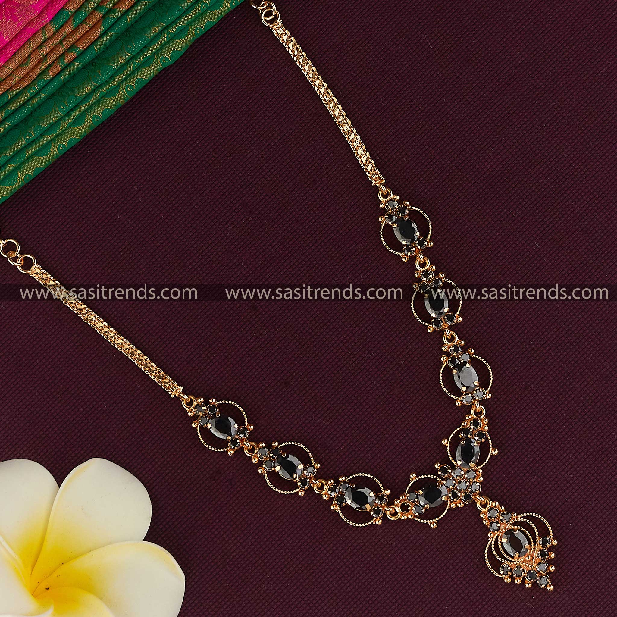 Black Beauty: Gold Plated Necklace with American Diamond Stones