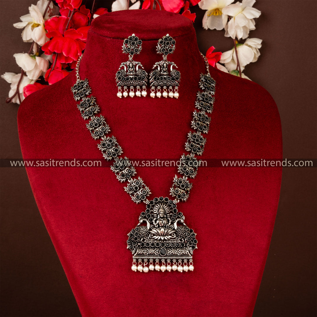 Lakshmi and Peacock Oxidised German Silver Necklace Set with Black Stones-Ideal for traditional parties and occasions.