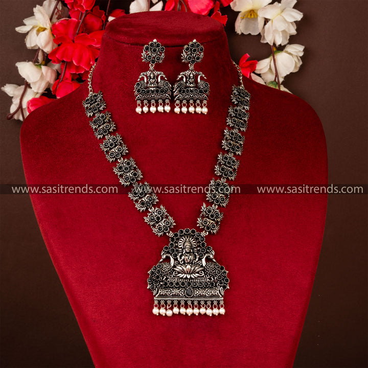 Lakshmi and Peacock Oxidised German Silver Necklace Set with Black Stones-Ideal for traditional parties and occasions.