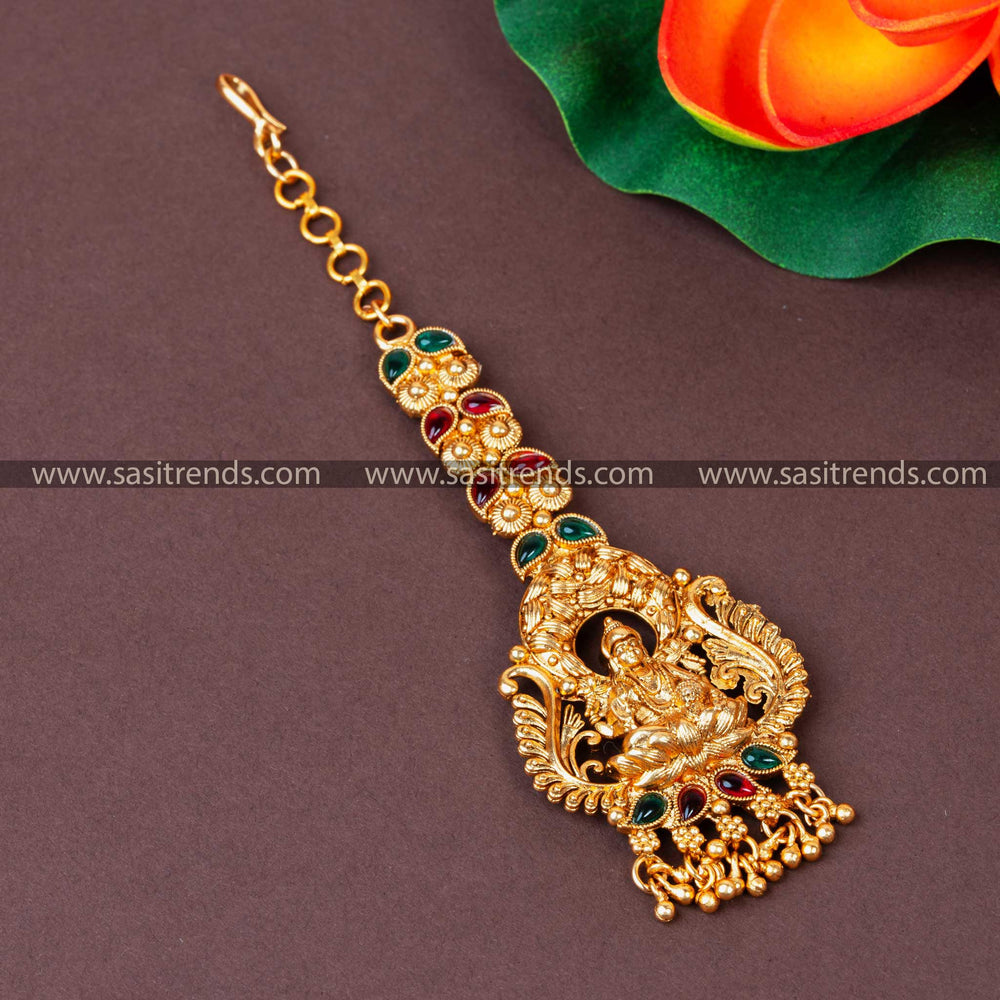 Traditional Matt Gold Plated Lakshmi Maang Tikka with Ruby & Emerald Green Stones