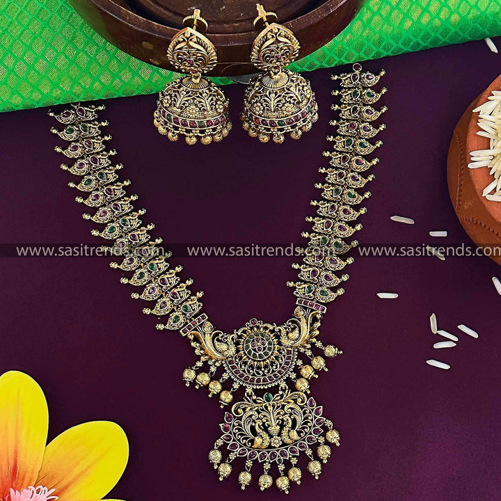 Trendy Traditional Bridal Wear Temple Matte Gold Plated Peacock Floral Dual Pendant Jewellery Set  | Sasitrends