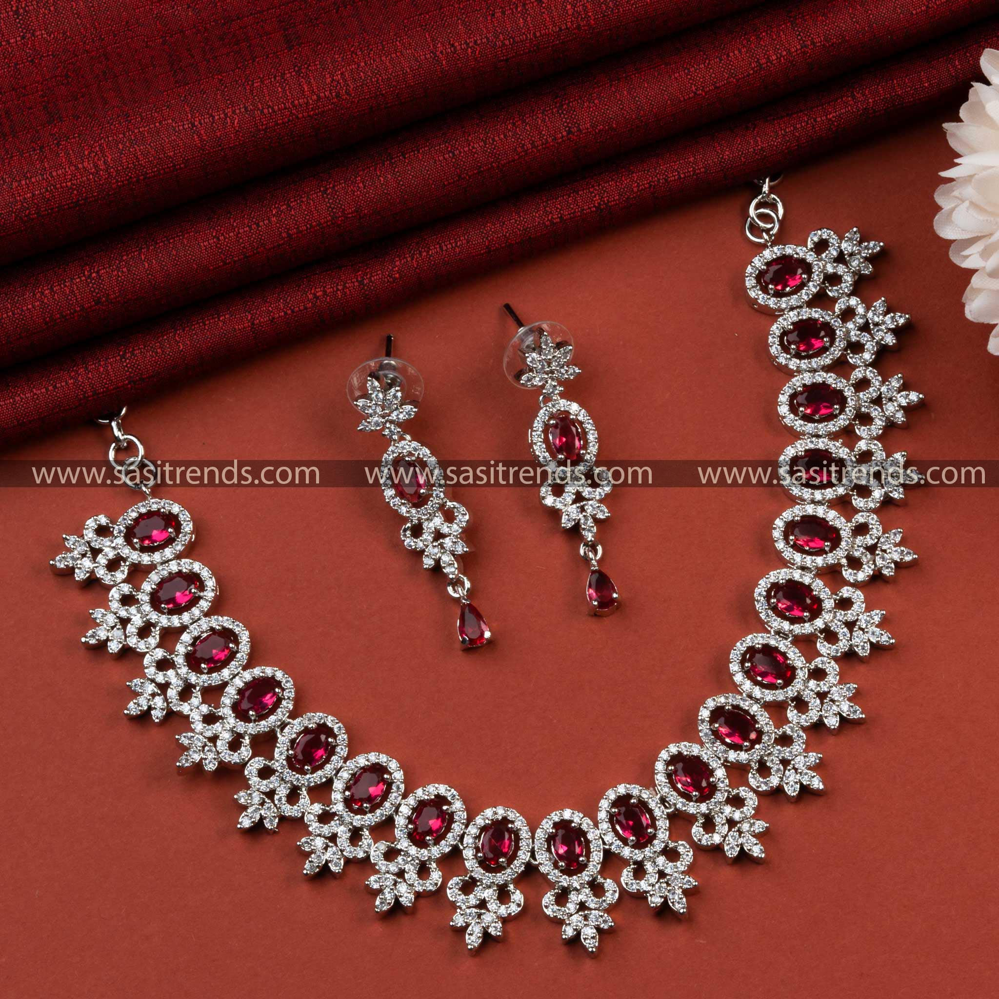 Dazzling Rhodium Silver Plated AD Necklace Set with Red Stone Motifs - Elevate Your Party Attire with Rich Accessories