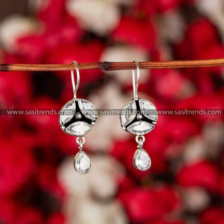 Crystal clear stone earrings with a lustrous shine on oxidised German silver