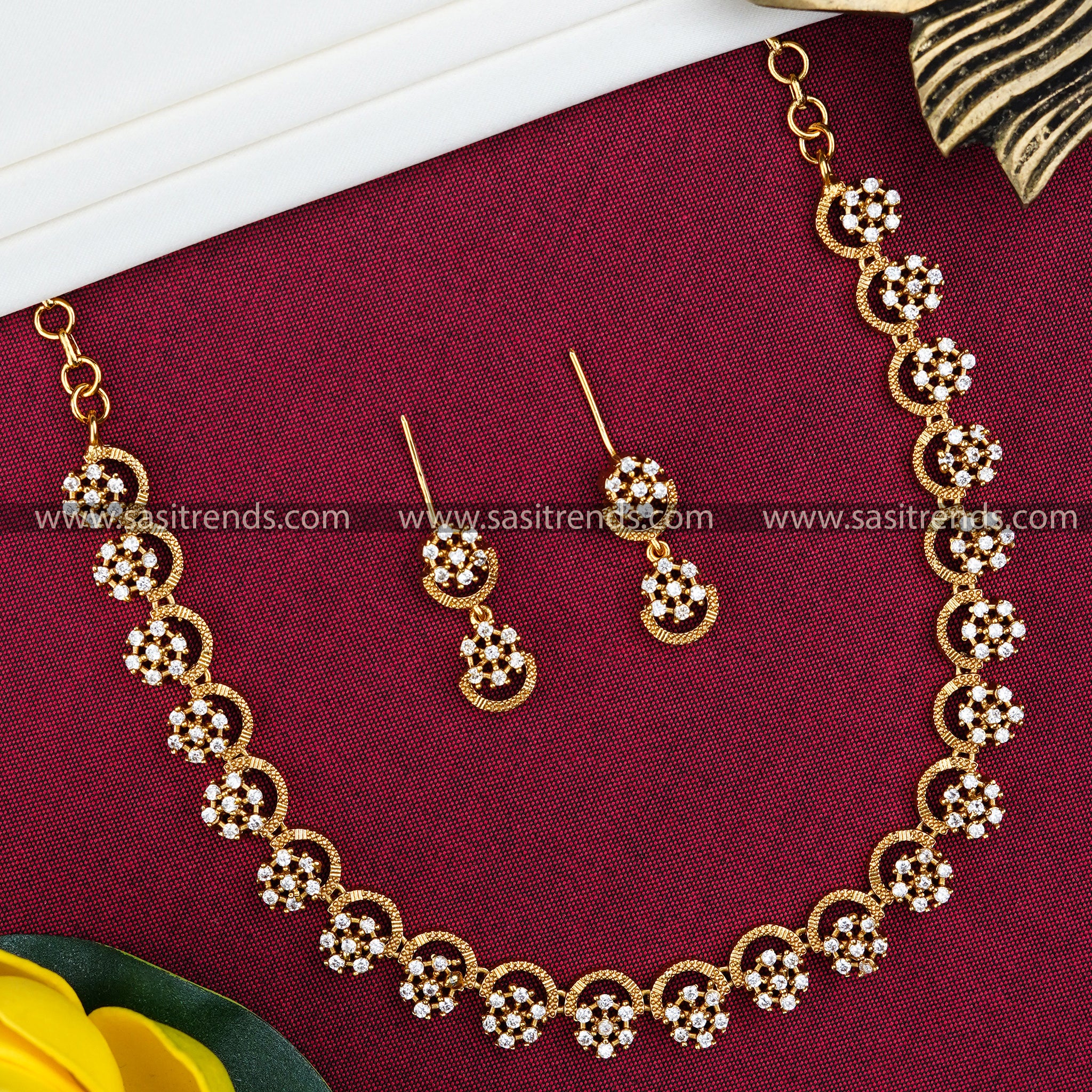 Matt Gold Finish and Flower American Stone Studded Necklace Set - Exquisite design with flower and moon motifs, perfect for parties.