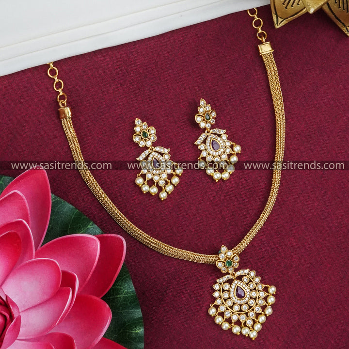 Rich-Ruby-Green Temple Gold Plated Attigai Necklace Earrings American Diamond Stones