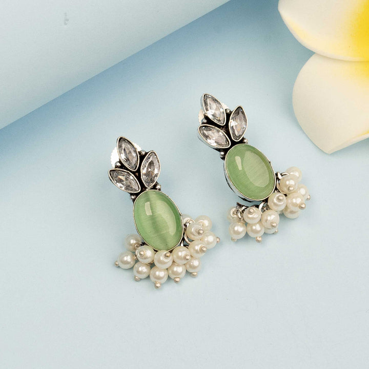 Graceful Light Green Oxidised Silver Tone Earrings with Monalisa Stones