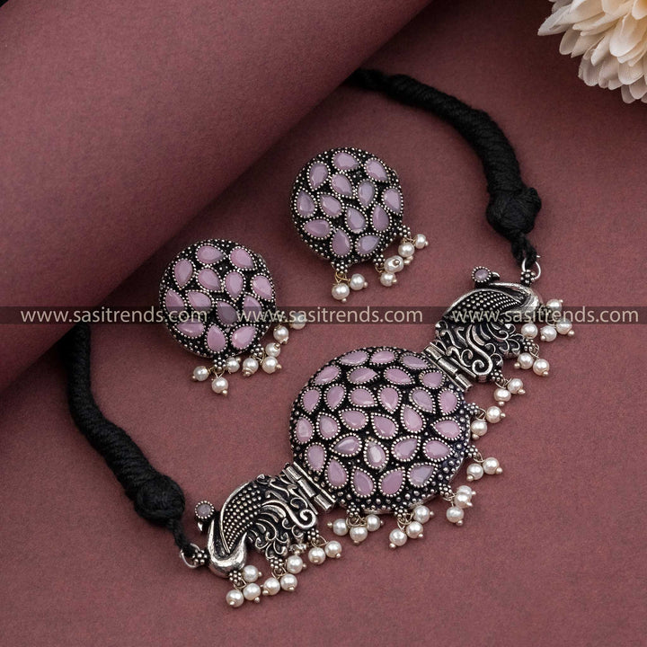 Delicate Baby Pink Peacock Design Oxidised German Silver Pearl Necklace Set