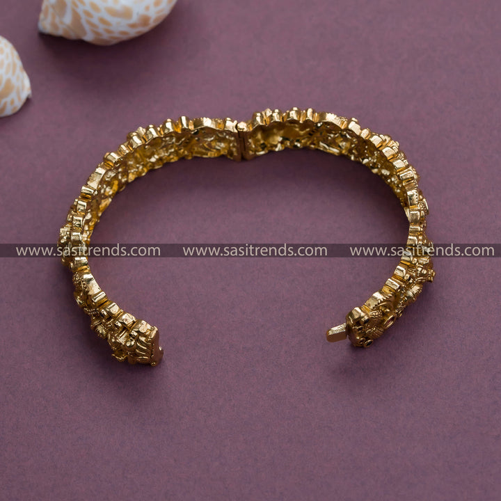 Matt Gold Plated Lakshmi & Peacock Motif Kada Bangle