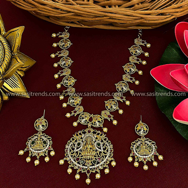 Graceful Temple Matte Gold Tone American Diamond Lakshmi & Peacock Pearl Jewellery Set | Sasitrends