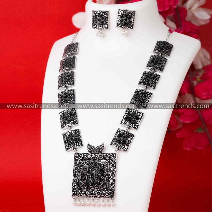 Stylish Oxidised German Silver Necklace with Trendy Black Stones Pendant and Complementary Pearl Earrings.