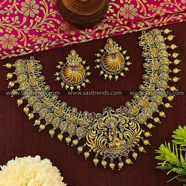 Bridal Wear Matte Gold Plated Lakshmi and Peacock Choker Jewellery Set | Sasitrends