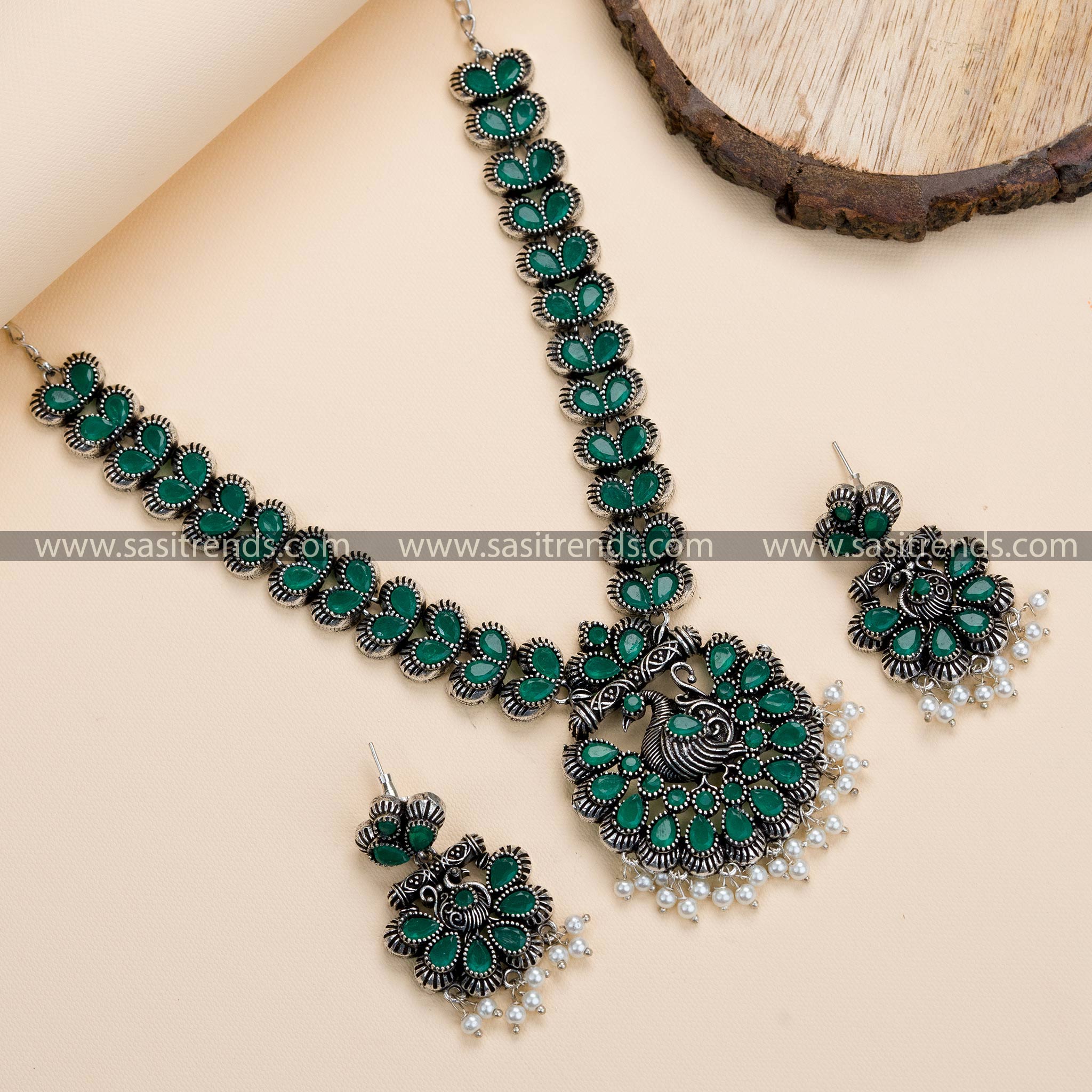 Trendy Party Wear Peacock Floral Oxidised German Silver Necklace Set with Earrings, Green Stone Embellishments