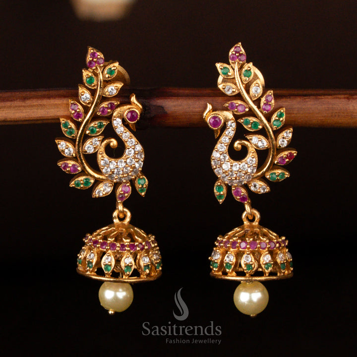 Traditional matte gold plated peacock jhumkas with shimmering American diamonds and multi-color stones, an ideal festive and wedding jewellery piece - Sasitrends