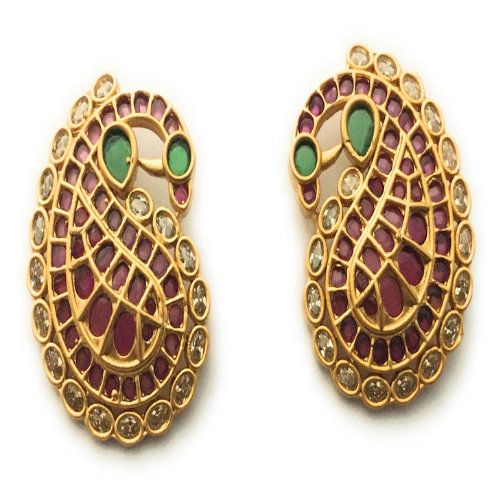 Detailed View of Gold Kemp Peacock Stud Earrings: Opulent Design with Gleaming Kemp Stones