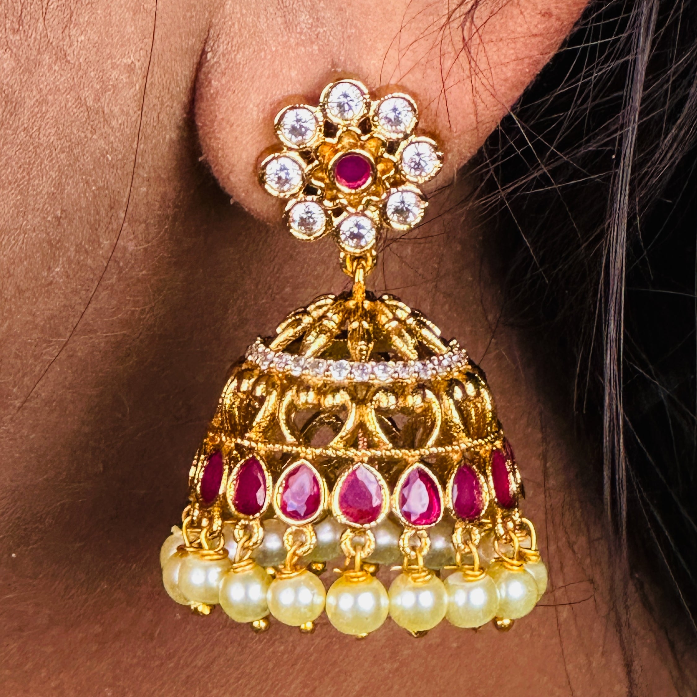 Elegant Brass Jhumka Earrings with Pearl Embellishments