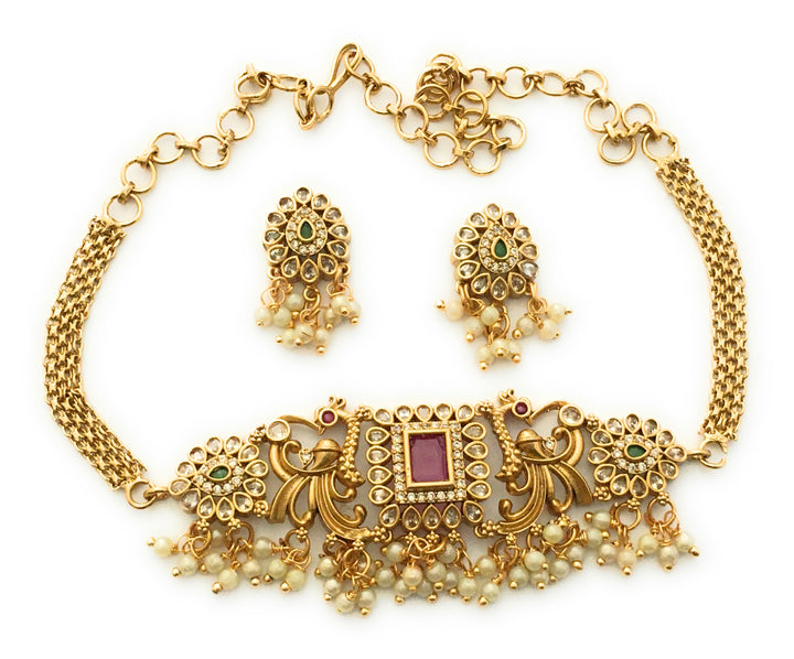 Trendy Temple Matte Gold Plated Peacock Choker Jewellery Set with AD Stones & Pearl Drops | Sasitrends