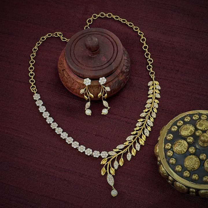 Gorgeous Temple Gold Plated Floral & Leaf Necklace Set with White Stones - Matte Gold Finish, Perfect Jewelry