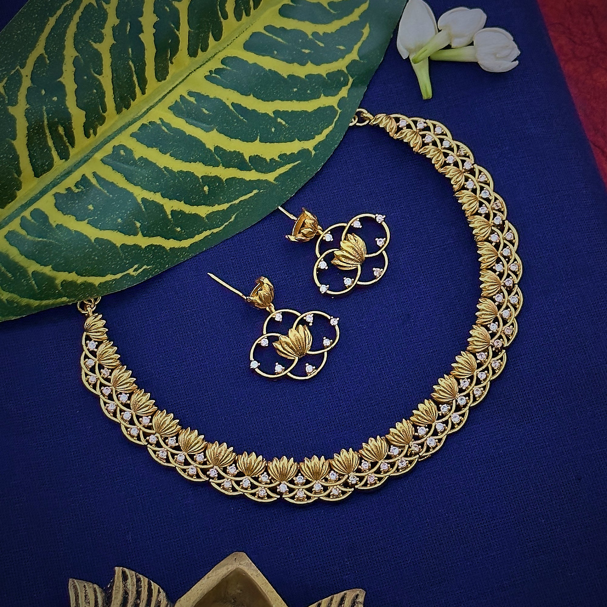 Matte Gold Plated Lotus Floral American Diamond Necklace Set with Earrings for Women