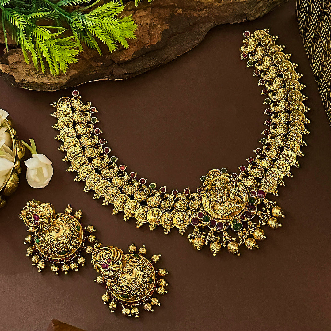 Traditional Bridal Lakshmi and Peacock Necklace Set with Matching Jhumkas - Matte Gold Plated Jewelry for Women