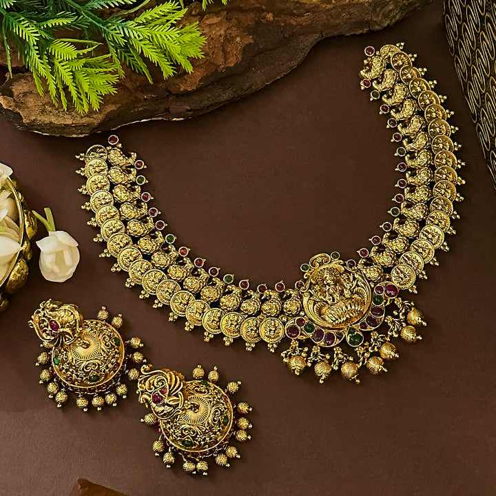 Traditional Bridal Lakshmi and Peacock Jewellery Set: Temple Matte Gold Plated Grandeur for Women | Sasitrends