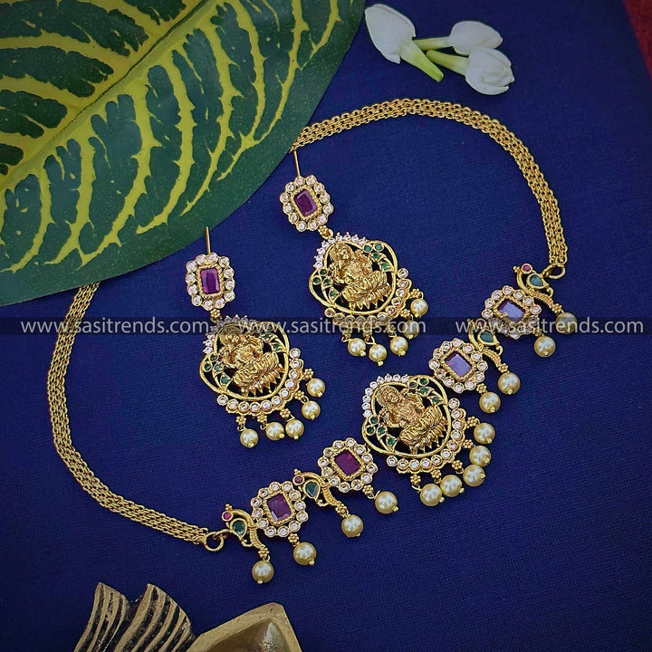 Gorgeous Temple Matte Gold Plated Lakshmi Pendant Choker Jewellery Set with AD Stones | Sasitrends