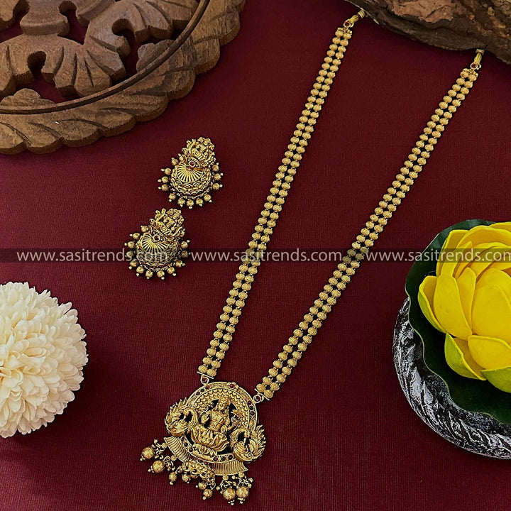 Bridal Goddess Lakshmi Pendant Ruby-Green Long Necklace Set with Jhumkas - Latest collection