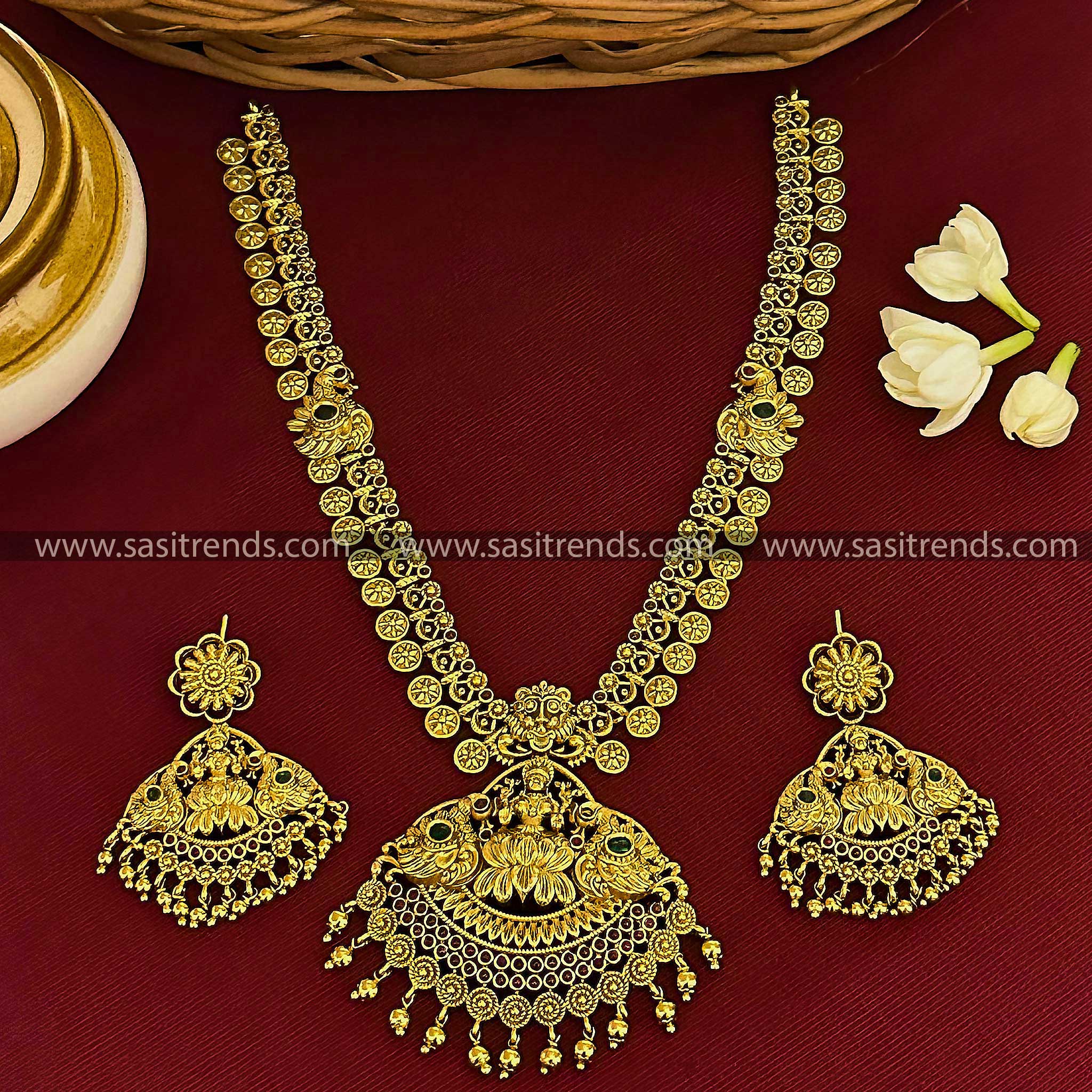 Lakshmi & Peacock Pendant Necklace with AD Stones in Matte Gold Finish