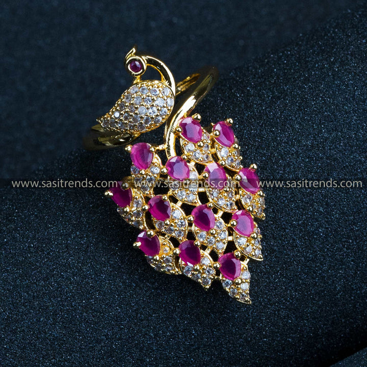 White Ruby Elegance: Gold Plated Peacock Adjustable Finger Ring with American Diamond Stones for Women - Bridal Collections