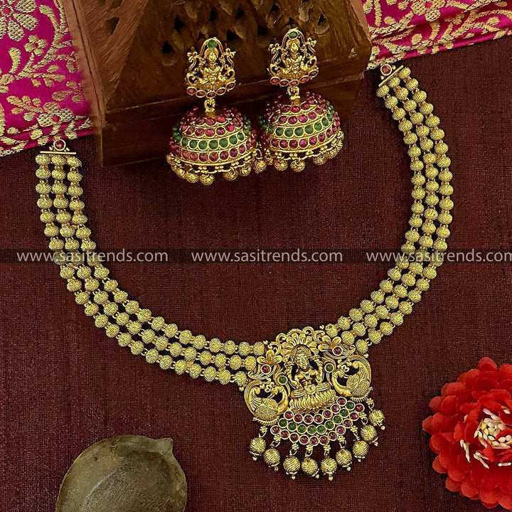 Traditional Bridal Wear Temple Matte Gold Tone Lakshmi Peacock Pendant Jewellery Set | Sasitrends