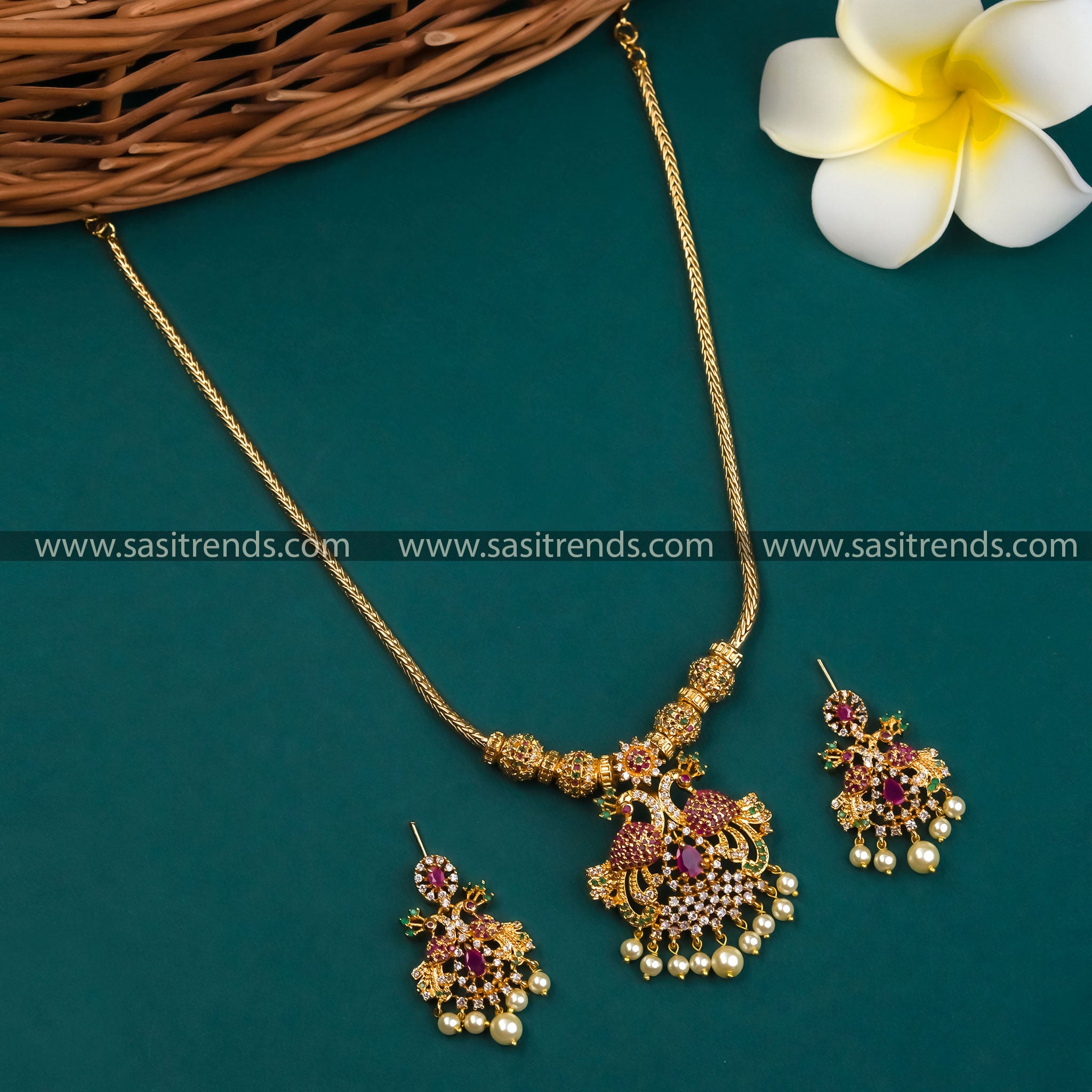 Captivating Micro Gold Plated Peacock Pendant Necklace Set with Earrings showcasing American Diamond Stones in a Multicolored array