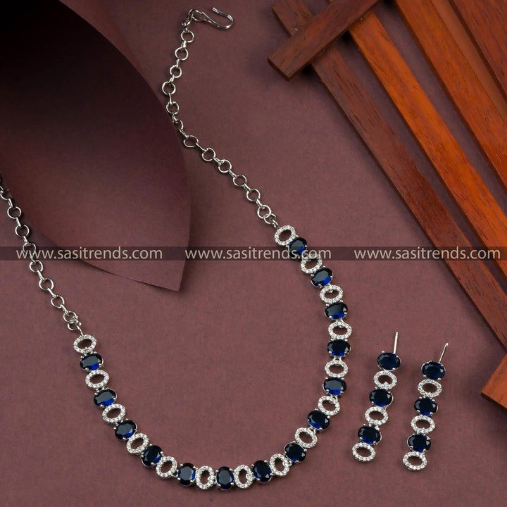 Stylish Rhodium Silver Plated Party Wear Blue AD Necklace Set with Earrings