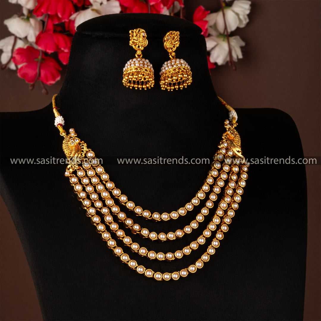 Latest Four Layer White Necklace With Jhumka Jewellery Set