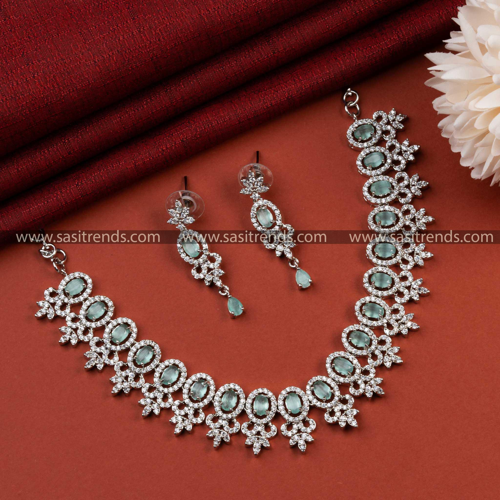 Glamorous Rhodium Silver Plated AD Party Wear Necklace Set with Mint Stone Accents - A Must-Have for Festive Celebrations