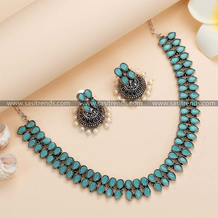 Fashionable Oxidised German Silver Necklace & Pearl Jhumkas with Mint Stone Accents - Trendy Party Accessories