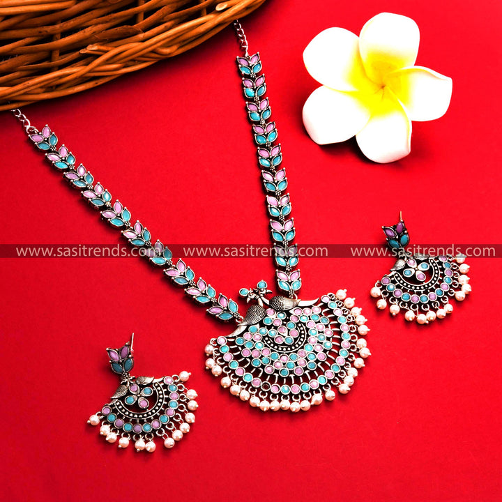 Oxidised Silver Ethnic Jewelry with Mint-Pink  Stones and Peacock-Floral Pendant - Trendy and Stylish